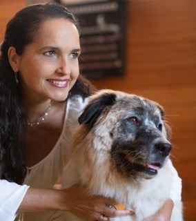 Paula Fontenelle, licensed therapist and mental health speaker in Oregon, with her dog