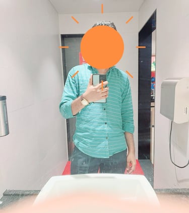 Male image in front of mirror taking photo of itself