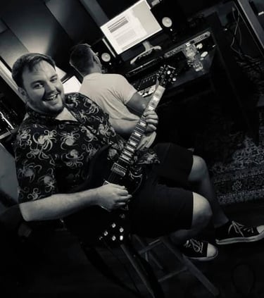 black and white image of john smiling