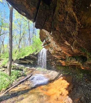 Huntsville, AL - View of Carter's Chalybeate waterfall from under the rock cliff in Monte Sano Park