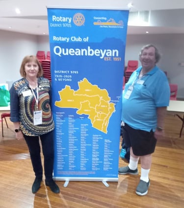 District Governor Andrea Grosvenor with RCQ Secretary Graham Wiggins