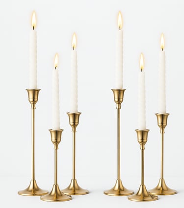 A product photo of six gold metal taper candle holders in varying heights with a white backround