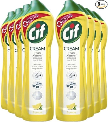 a group of four bottles of cream cream