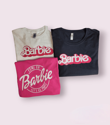a variety of barbie T-shirts