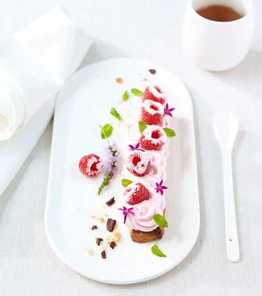 a dessert with a cup of coffee and a cup of coffee