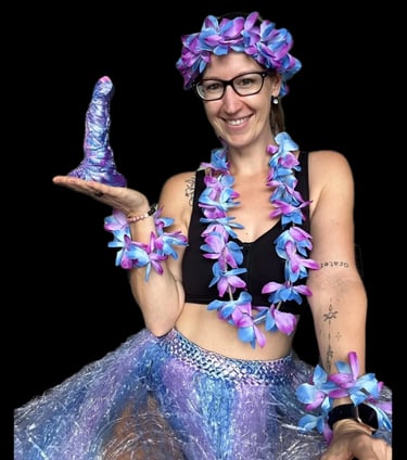 Pleasurelit Patricia holding the Selene Moon Goddess Dildo for a review