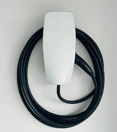 Tesla Gen 3 EV charger mounted in garage by Auckland electrician
