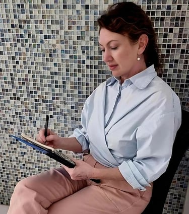 Female clinical hypnotherapist taking notes