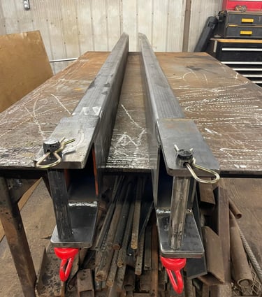 fork lift fork extensions showing safety pins lock