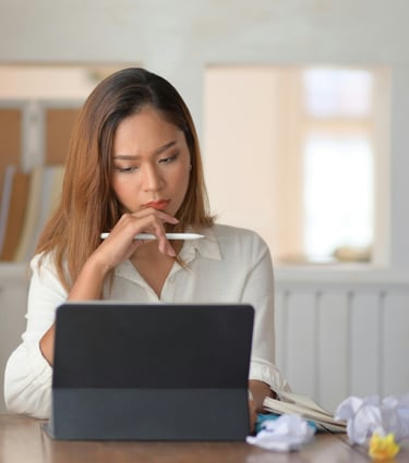 A young professional woman focused on a p[roject.