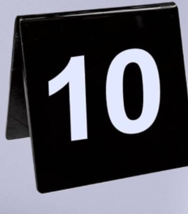 Black Acrylic Table Tent with a number 1 and 10 white font