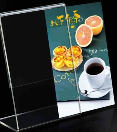 Clear L-type acrylic holder showcasing coffee and pastries papers..