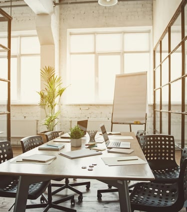 Empty meeting room with flip chart
