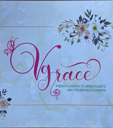 VGrace floral shop sign with marble background, offering fresh to preserved flowers.