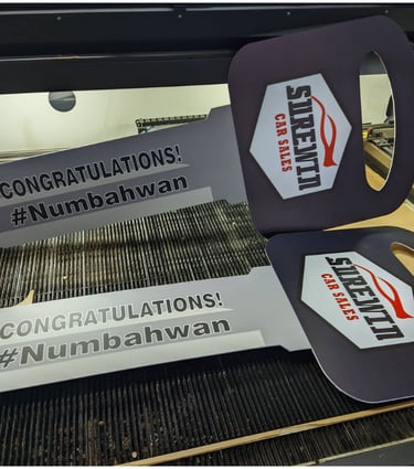 Celebratory car sales sintra board sticker with hashtag and logo.