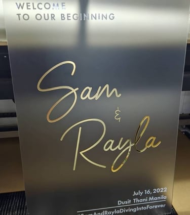 Elegant frosted acrylic wedding sign with gold script for Sam & Rayla, Dusit Thani Manila