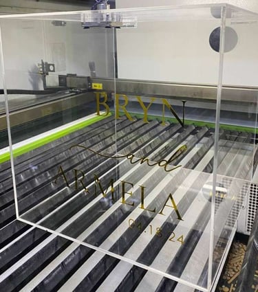 Clear Acrylic Wedding Box with gold lettering personalized for 'BRYN and ARMELA' dated '04.18.24'