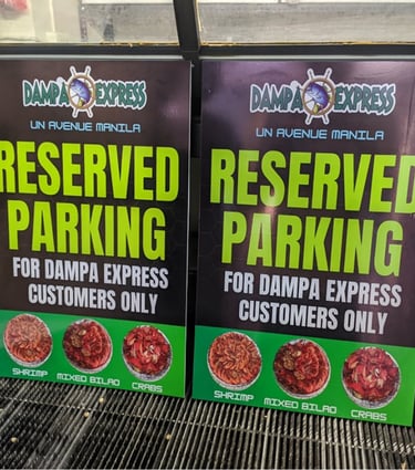 Dampa Express reserved parking sintra board sign for customers.