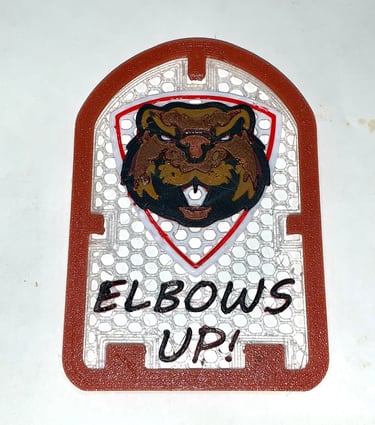 [breathe] mask decoration with a stern looking beaver head and the slogan "Elbows Up!" 
