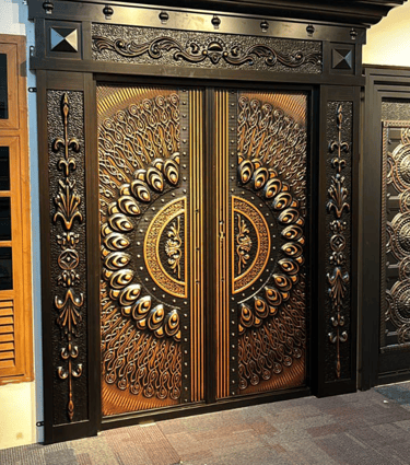 a large metal door with ornate metal and wood doors. Steel doors and windows 
