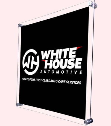 Acrylic Wall Frame with Black Background & White House Automotive Logo