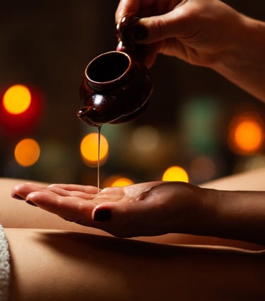 a woman getting a massage at a spa