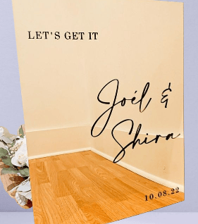 Chic gold acrylic wedding sign for Joël & Shira with date.