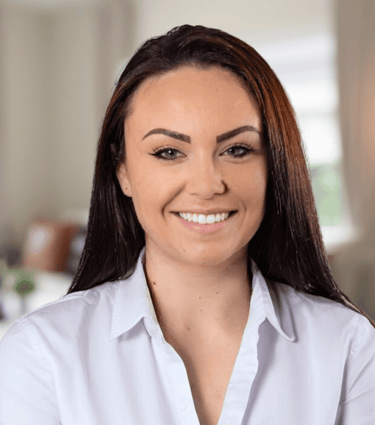 a woman with a smile on her face