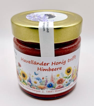 Honig mit Himbeeren