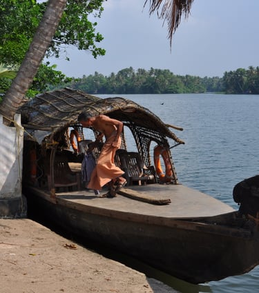 wooden boat on the water in Kochi, Kerala, India