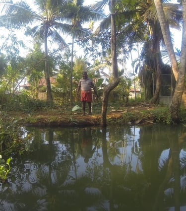 locals on the waterway at Alappuzha, Kerala, India
