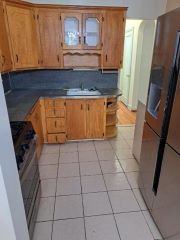 Kitchen with washer/dryer hook-up.