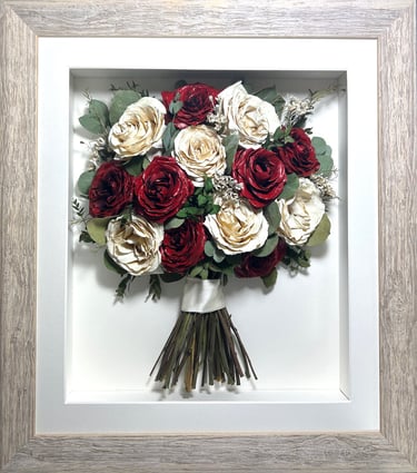 a side view preserved wedding bouquet with red and white roses