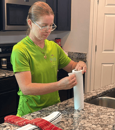 Danny from Brazil in America Cleaning preparing kitchen area during a residential cleaning in Brevar