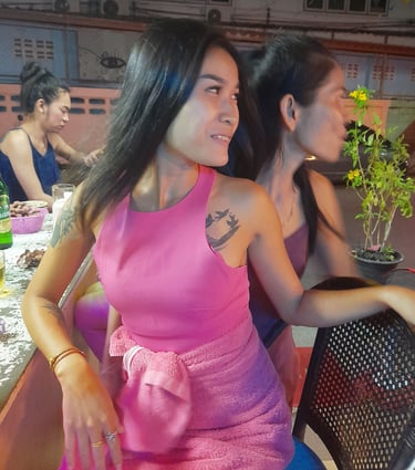Thai women in Nees Tiki Club, sat at the bar, in Hua Hin