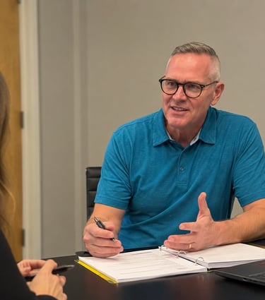 Doug in a meeting with a client