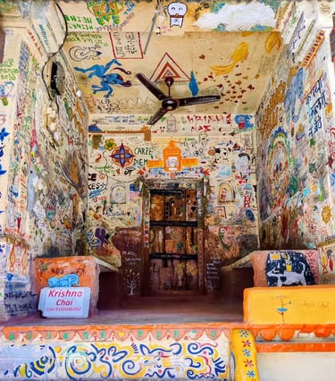 Artistic graffiti and travel doodles inside Krishna’s famous tea stall in Bundi, Rajasthan.