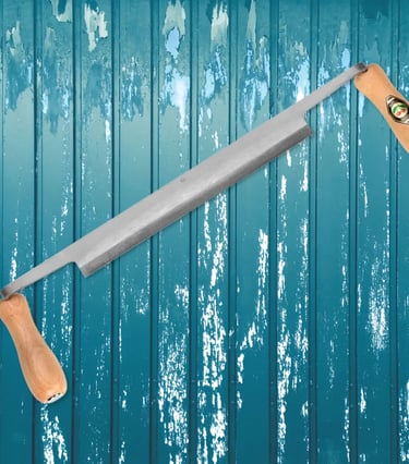 a drawknife up against a blue timber wall