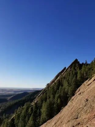 Steep angled Flatiron ridge showing classic beginner-friendly climbing route Boulder