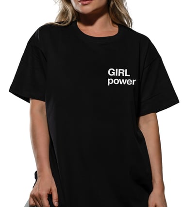 Woman wearing a black cotton t-shirt featuring a white Girl Power slogan on the chest.