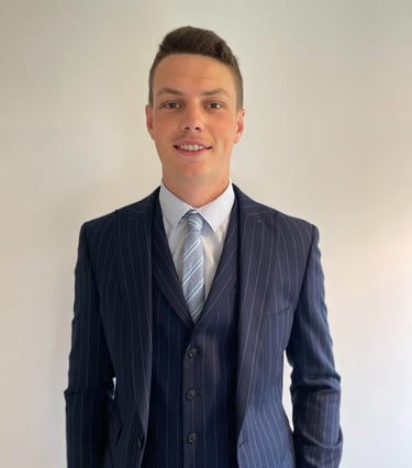 Daniel Stansbie in a blue pinstripe suit