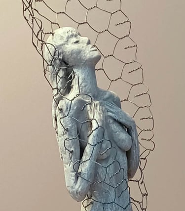 A clickable link leading to a page with further information about the sculpture 'Solitude'