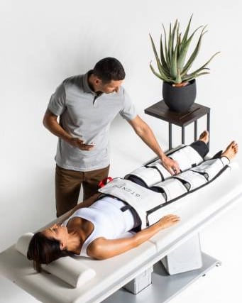 Photo of male physiotherapist utilising Stendo on a female patient