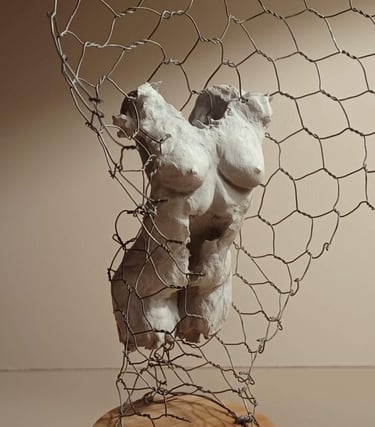 A clickable link leading to a page with information about the sculpture 'Ensconced'