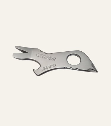 Gerber Shard compact keychain multitool featuring a bottle opener and pry bar on a white background.