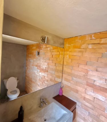 bathroom in the rooftop terrace in this vacation home in san miguel de allende