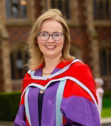 Dr Caroline Millar in formal PhD regalia at Queens University Belfast