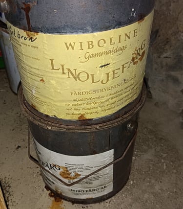Two old linseed oil hinks for natural barn paint