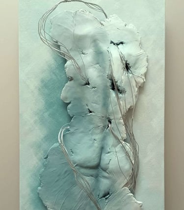 A relief sculpture of a fragmented female (rear view) entwined with wires, painted grey-blues