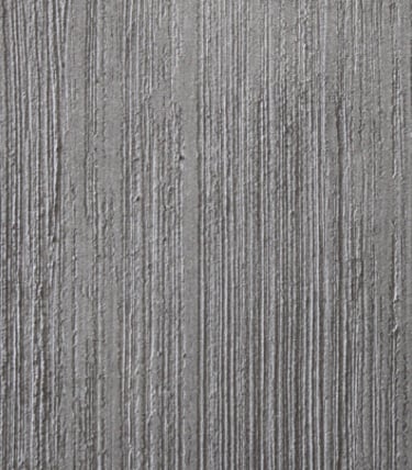 Microcemento metallic plateado, con textura aplicación  sobre muro